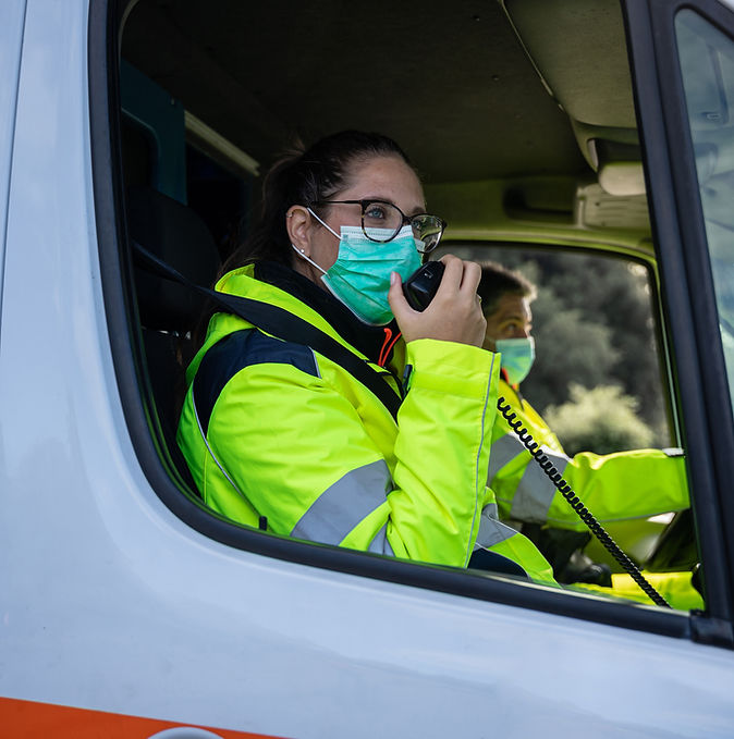 Emergency medical professional communicating from an ambulance